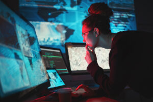 Cybersecurity, woman and computer with global network for phishing, ransomware and cyber search. Ma.
