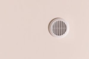 Air vent on beige ceiling