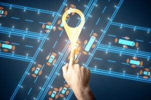 Hand Pointing At Location Pin On Abstract Digital App