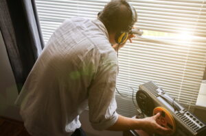 Special Agent Listens On The Reel Tape Recorder.